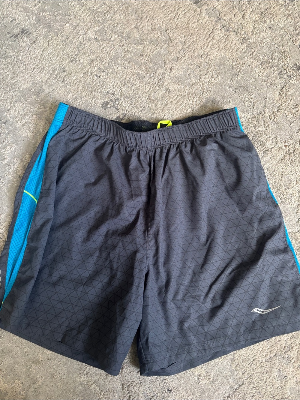 Saucony Men's Black Shorts with Blue Side Panels